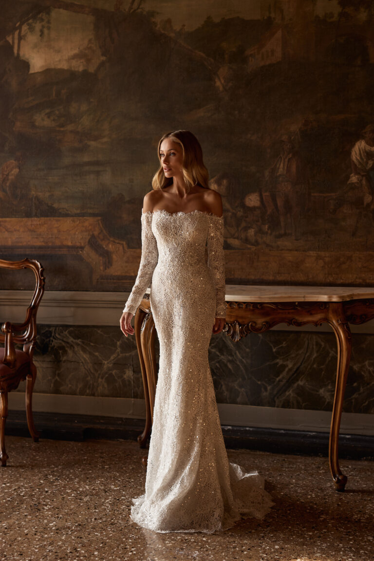 Glamurozna sirena od svjetlucave čipke sa rukavima