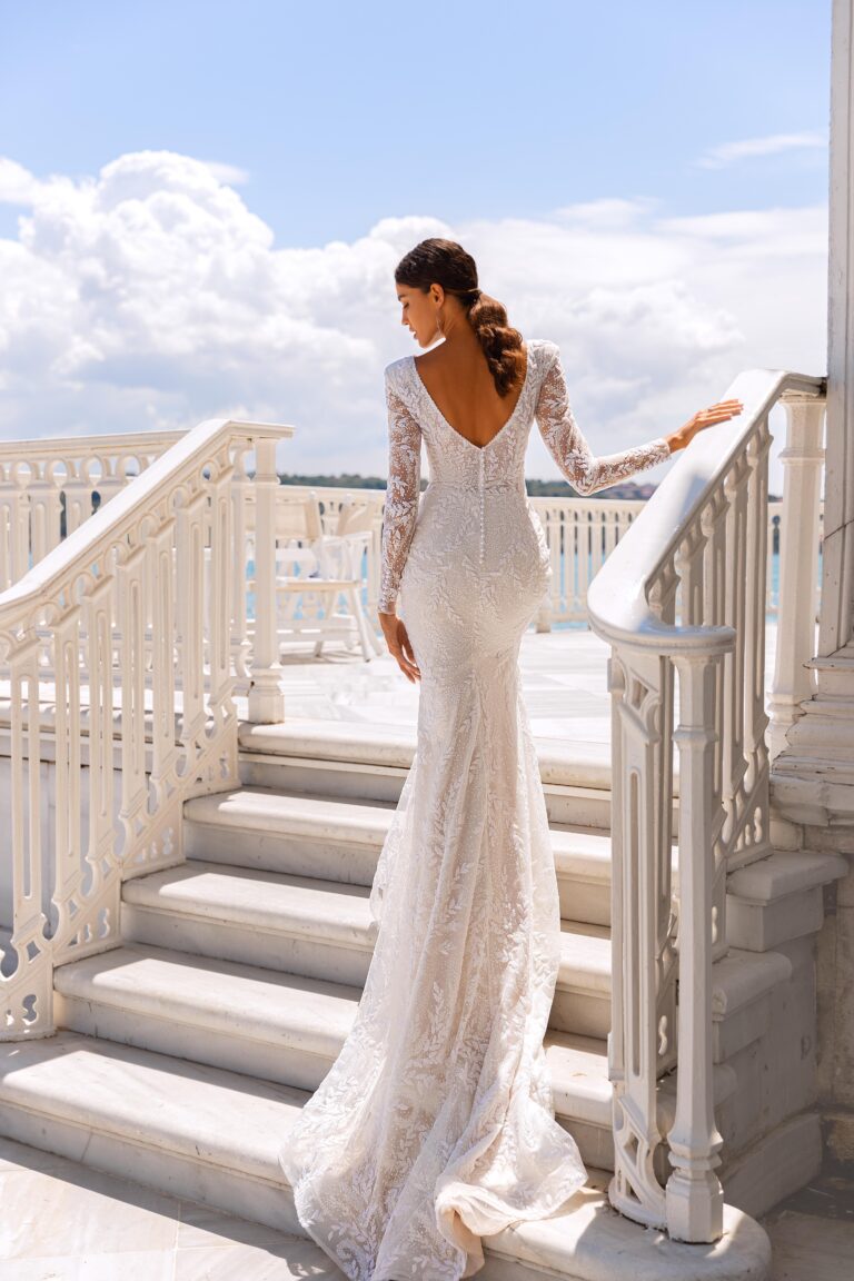 Otvorena leđa sirena vjenčanice sa rukavima