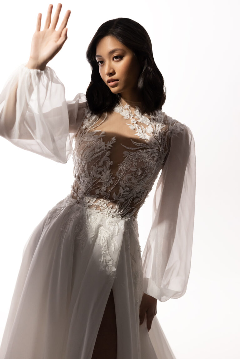 A kroj lepršava vjenčanica providnog gornjeg dijela